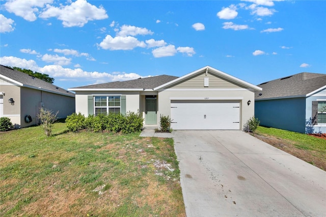 11207 Amber Ridge Dr, Zellwood, FL 32798 - ranch-style home featuring driveway, a front yard, an attached garage, and stucco siding