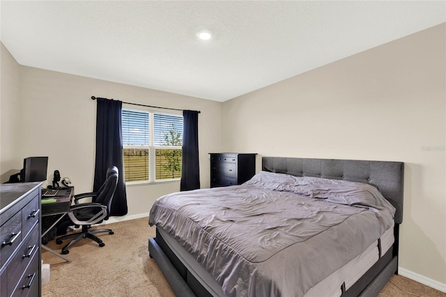 11207 Amber Ridge Dr, Zellwood, FL 32798 - bedroom with baseboards and light colored carpet
