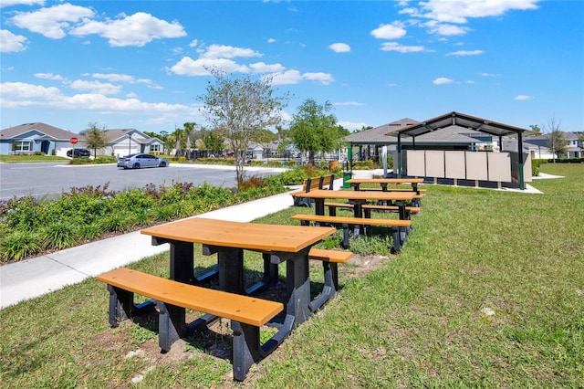 11207 Amber Ridge Dr, Zellwood, FL 32798 - view of home's community with a residential view and a yard