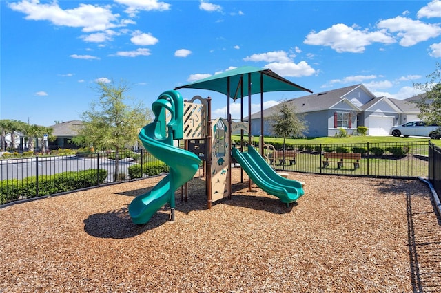 11207 Amber Ridge Dr, Zellwood, FL 32798 - communal playground with a residential view and fence