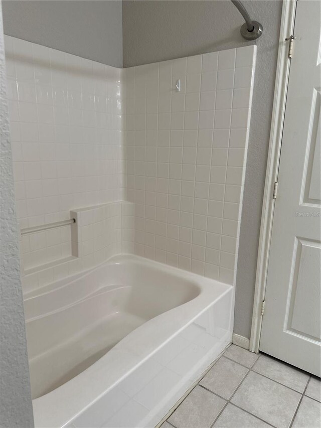 860 N Orange Ave Unit 149, Orlando, FL 32801 - full bathroom with tile patterned floors and shower / bath combination