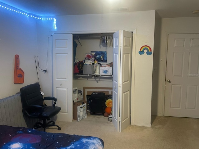 5471 Vineland Rd Unit 7108, Orlando, FL 32811 - bedroom featuring a closet and carpet