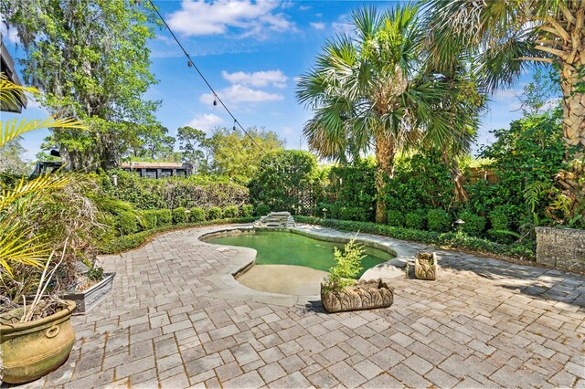 1701 Palmer Ave, Winter Park, FL 32789 - view of home's community with a patio