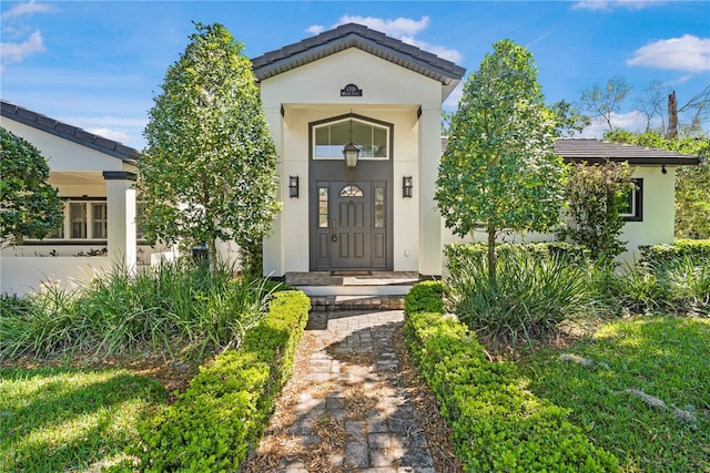 1701 Palmer Ave, Winter Park, FL 32789 - entrance to property featuring stucco siding