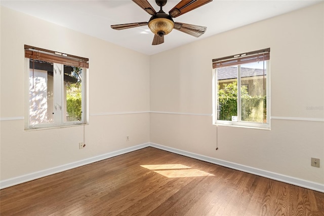 1701 Palmer Ave, Winter Park, FL 32789 - spare room featuring wood finished floors, baseboards, and ceiling fan