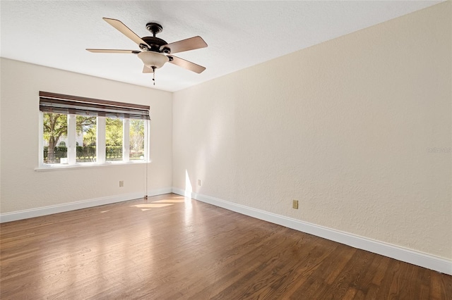 1701 Palmer Ave, Winter Park, FL 32789 - unfurnished room featuring ceiling fan, baseboards, wood finished floors, and a textured wall