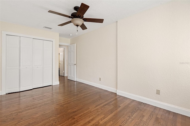 1701 Palmer Ave, Winter Park, FL 32789 - unfurnished bedroom featuring wood finished floors, visible vents, baseboards, ceiling fan, and a closet