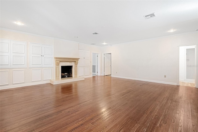 1701 Palmer Ave, Winter Park, FL 32789 - unfurnished living room featuring visible vents, ornamental molding, baseboards, and wood finished floors