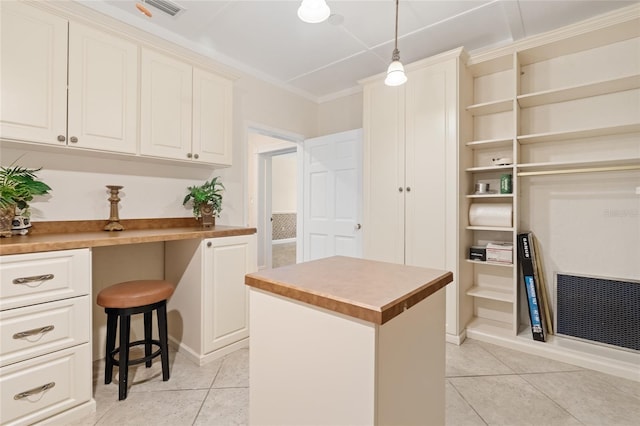 1701 Palmer Ave, Winter Park, FL 32789 - interior space with light tile patterned floors, visible vents, and white cabinetry
