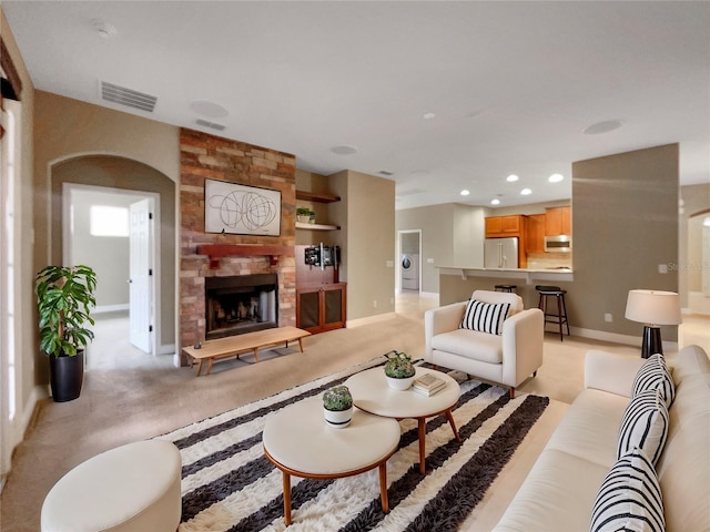 30411 Gidran Ter, Mount Dora, FL 32757 - living room with recessed lighting, a fireplace, visible vents, and baseboards