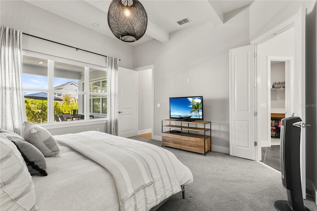 14004 Gullstrand Ave, Orlando, FL 32827 - carpeted bedroom with baseboards, beamed ceiling, and visible vents