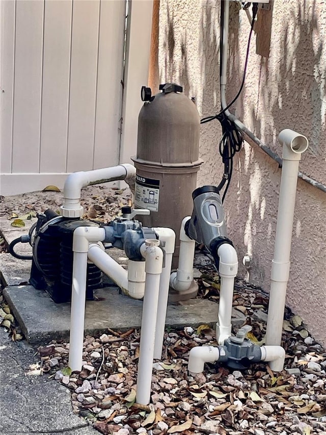 exterior details featuring pump