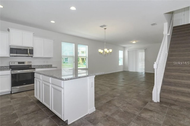 kitchen with open floor plan, visible vents, an inviting chandelier, recessed lighting, and appliances with stainless steel finishes