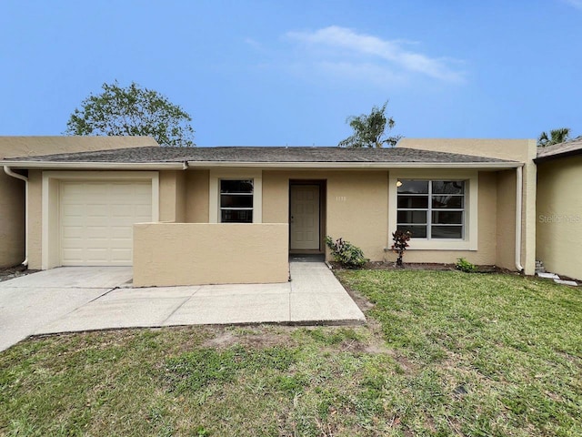 ranch-style house with stucco siding, a front lawn, concrete driveway, and an attached garage