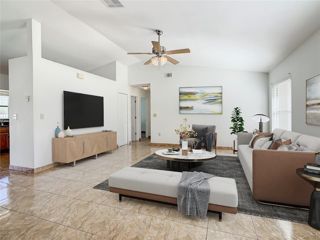 855 San Pedro Ct, Kissimmee, FL 34758 - living room with lofted ceiling, baseboards, marble finish floor, visible vents, and ceiling fan