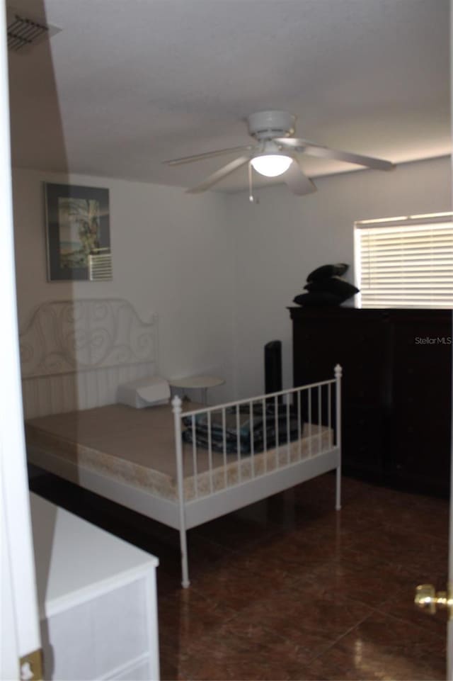 855 San Pedro Ct, Kissimmee, FL 34758 - bedroom with a ceiling fan and visible vents