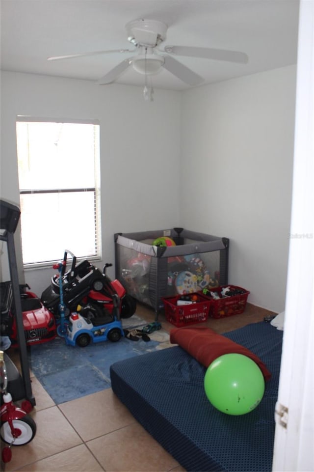 855 San Pedro Ct, Kissimmee, FL 34758 - tiled bedroom featuring ceiling fan