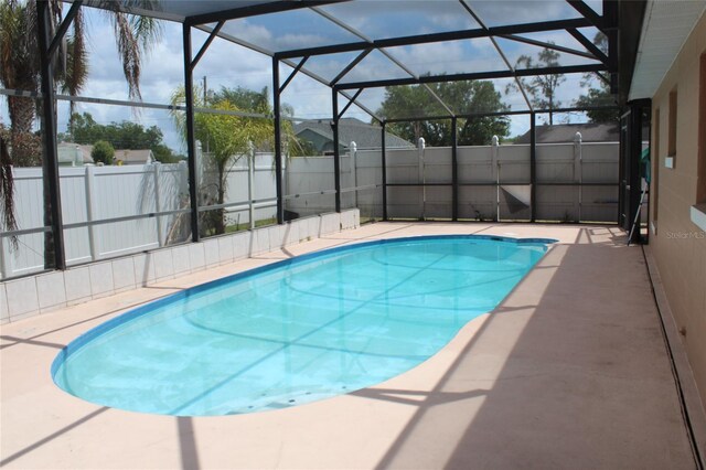 855 San Pedro Ct, Kissimmee, FL 34758 - view of pool with a patio, fence, a fenced in pool, and a lanai
