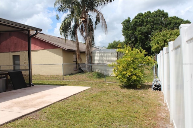 855 San Pedro Ct, Kissimmee, FL 34758 - view of yard featuring fence and a patio area