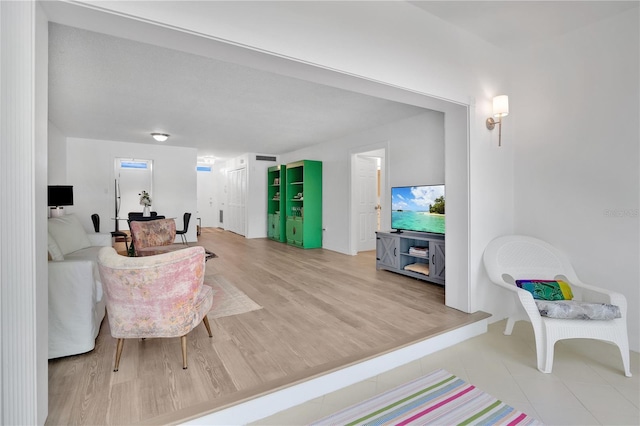 700 Melrose Ave Unit L-23, Winter Park, FL 32789 - living room featuring wood finished floors and baseboards