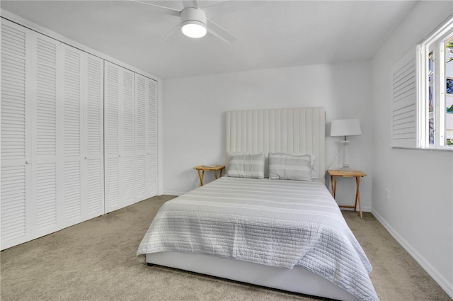 700 Melrose Ave Unit L-23, Winter Park, FL 32789 - carpeted bedroom featuring a closet, baseboards, and ceiling fan