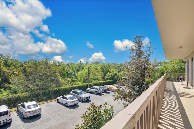 700 Melrose Ave Unit L-23, Winter Park, FL 32789 - uncovered parking lot with a wooded view