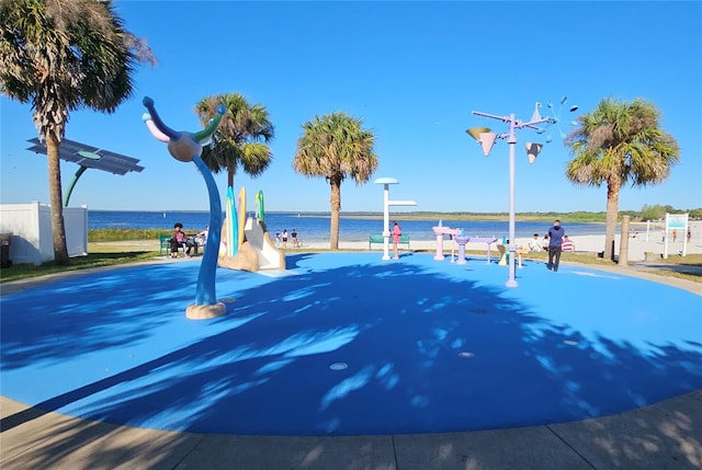 exterior space with a water view