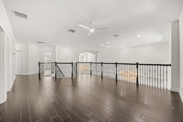 spare room with recessed lighting, visible vents, wood finished floors, and a ceiling fan