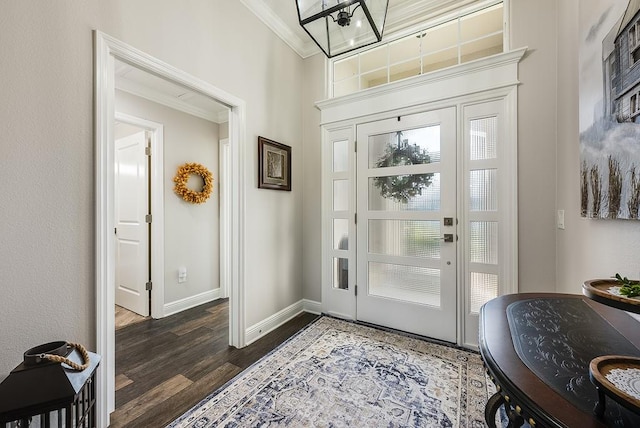 5729 Hickey Way, The Villages, FL 32163 - entrance foyer with ornamental molding, dark wood-style floors, and baseboards
