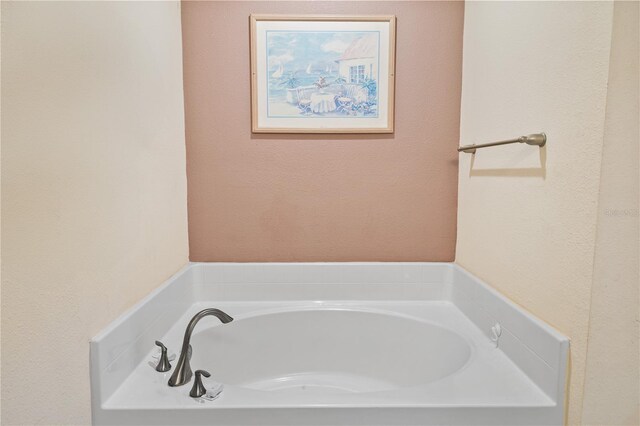 bathroom featuring a garden tub