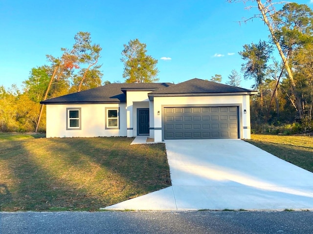 16407 SW 21st Terrace Rd, Ocala, FL 34473 - single story home with a garage, a front yard, concrete driveway, and stucco siding