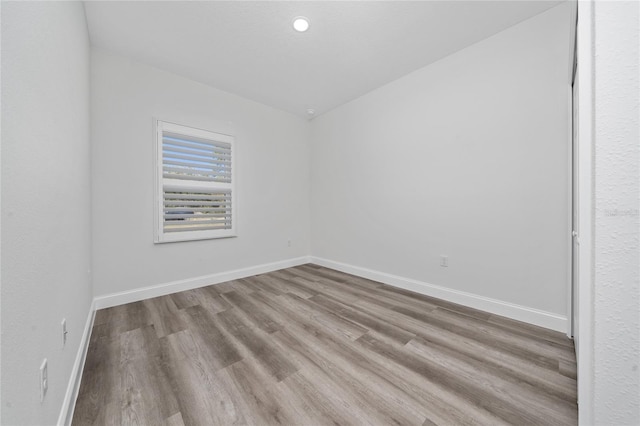 16407 SW 21st Terrace Rd, Ocala, FL 34473 - empty room with baseboards and wood finished floors
