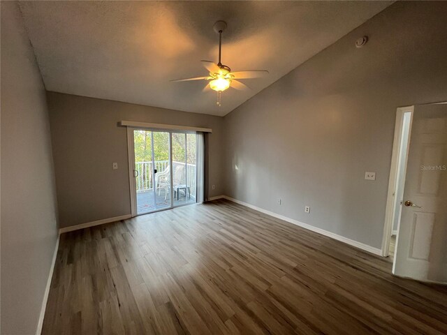 2020 Royal Bay Blvd Unit 92, Kissimmee, FL 34746 - unfurnished room featuring ceiling fan, lofted ceiling, wood finished floors, baseboards, and a smoke detector