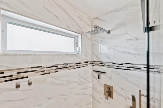 full bathroom with a shower stall