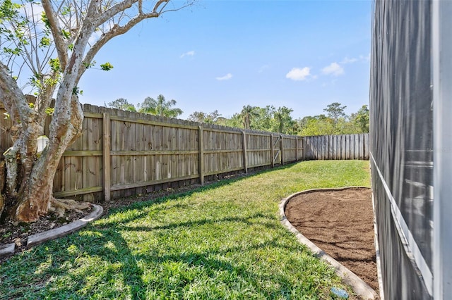 view of yard featuring a fenced backyard