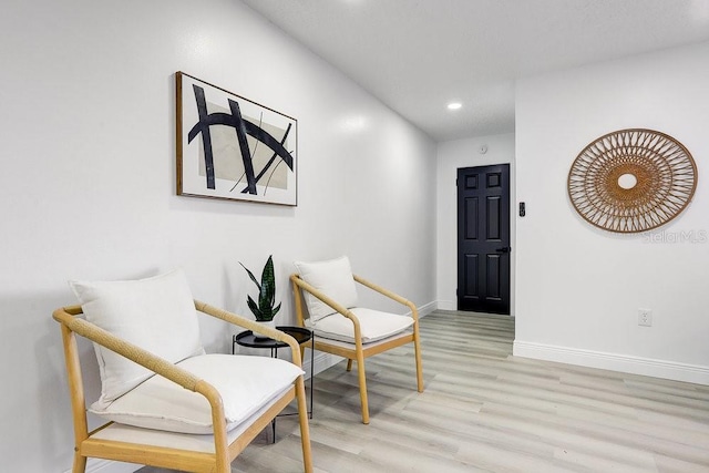 4907 21st Ave W, Bradenton, FL 34209 - sitting room with recessed lighting, light wood-style flooring, and baseboards
