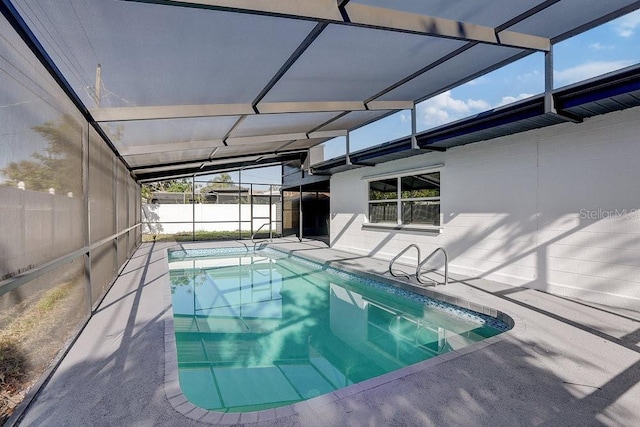 4907 21st Ave W, Bradenton, FL 34209 - view of swimming pool featuring a patio, fence, a fenced in pool, and a lanai