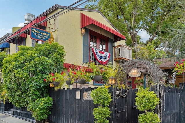 view of property featuring fence