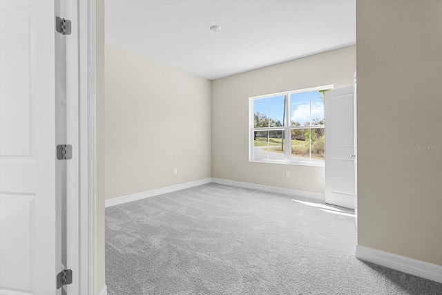 1973 E Celina St, Inverness, FL 34453 - carpeted empty room with baseboards