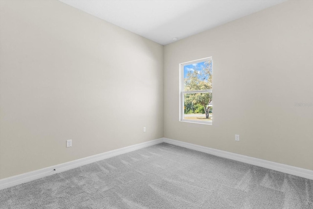 1973 E Celina St, Inverness, FL 34453 - unfurnished room featuring light carpet and baseboards