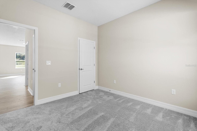 1973 E Celina St, Inverness, FL 34453 - unfurnished bedroom with carpet and baseboards