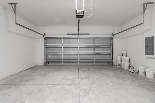 1973 E Celina St, Inverness, FL 34453 - garage with electric panel and a garage door opener