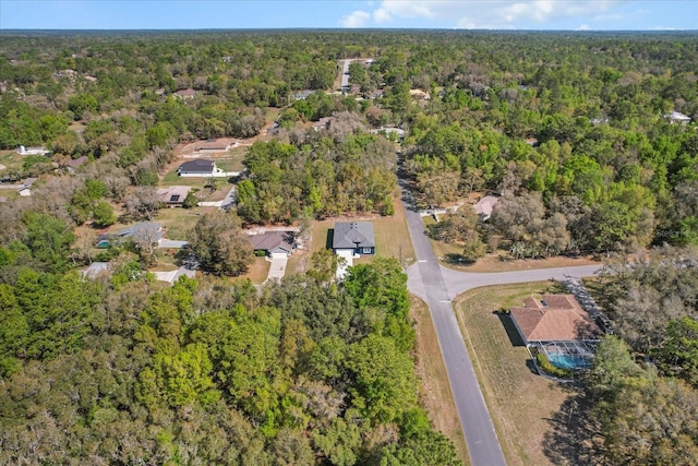 1973 E Celina St, Inverness, FL 34453 - aerial overview of property's location with a heavily wooded area