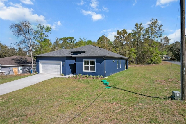 1973 E Celina St, Inverness, FL 34453 - view of front of house featuring a garage, a front yard, concrete driveway, stucco siding, and roof with shingles