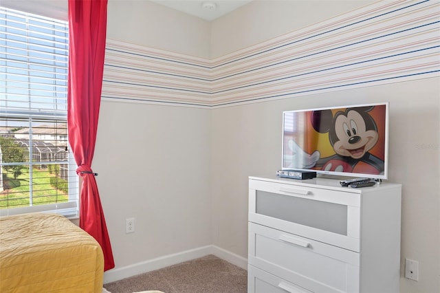 1551 Flange Dr, Davenport, FL 33896 - bedroom with carpet flooring and baseboards