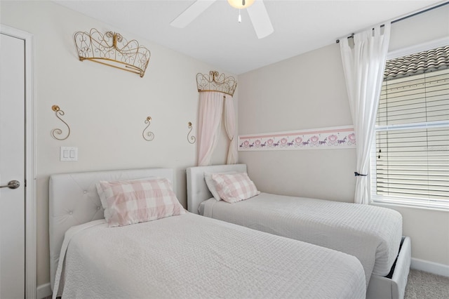 1551 Flange Dr, Davenport, FL 33896 - carpeted bedroom featuring baseboards and a ceiling fan