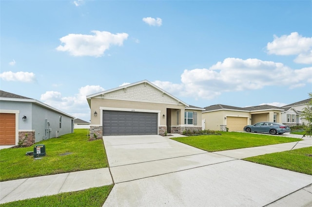 ranch-style house with stone siding, an attached garage, concrete driveway, and a front lawn
