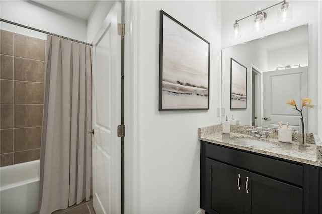 bathroom featuring shower / bath combination with curtain and vanity