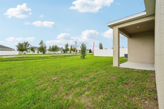 view of yard with a patio area and fence
