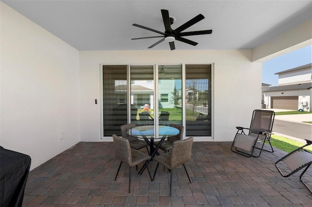 4911 Shady Pines Dr, Saint Cloud, FL 34772 - view of patio with a ceiling fan and outdoor dining area